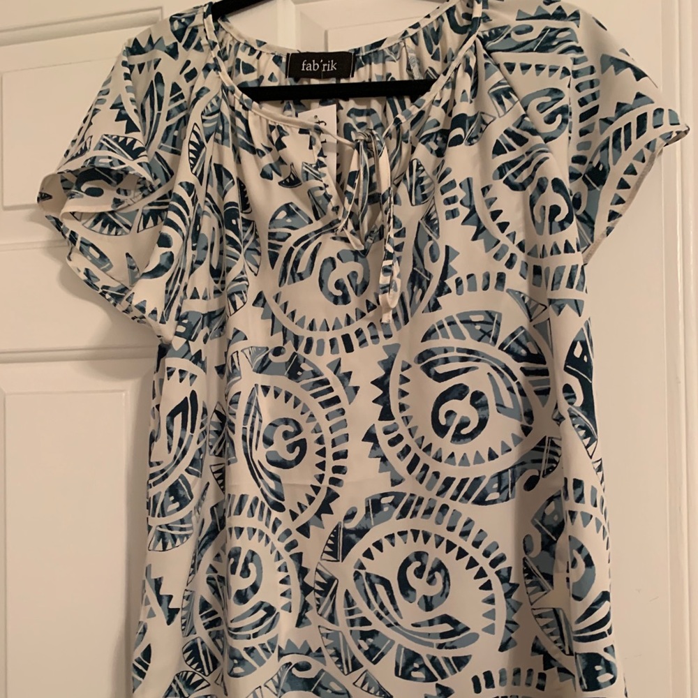 Green and white printed blouse